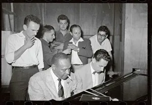 Onlookers at Piano with Lionel Hampton