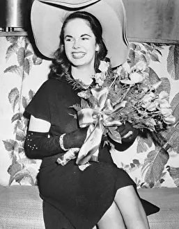 Debutante Prints: Oona O'Neill Seated With Flowers