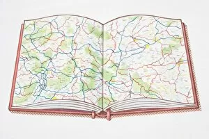 Open atlas, showing road map across double page