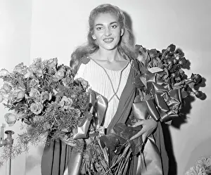 Opera Singer Maria Callas Holding Two Large Bouquets