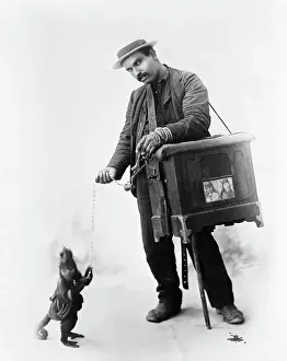 Organ Grinder And Monkey Collect Money