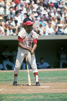 Orlando Cepeda Standing with Baseball Bat Between His Legs