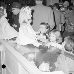 Orphan Prints: Orphans Looking at Dolls at Macy's