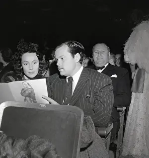 Orson Welles and Dolores Del Rio Seated in Auditorium
