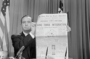 Orval E. Faubus Holding Up Newspaper