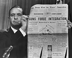 Orval Faubus Holding Newspaper at Address