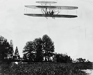 Biplane Prints: Orville Wright's Plane Near Ground