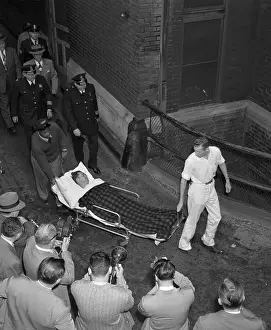 Oscar Collazo Being Wheeled Away