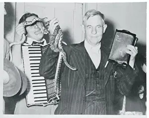 Oscar Hutton Holding Bible and Snakes
