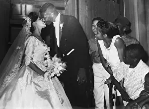 Oscar Robertson Kissing Bride