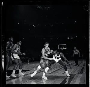 Oscar Robertson Trying to Retrieve Ball