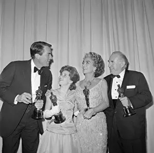 Oscar Winners Hold Their Statuettes