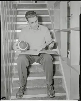 Otto Graham Holding Football and Reading