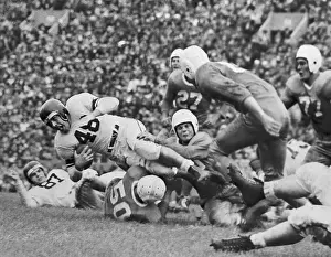 Otto Graham Leaping With Football