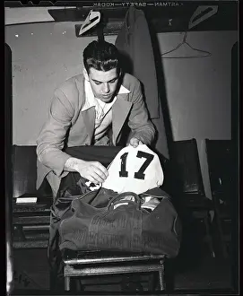 Otto Graham Placing Uniform Away