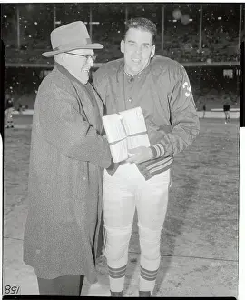 Otto Graham Posing with John H. Borland on Football Field
