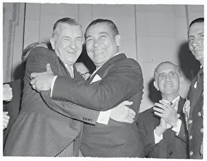 Outgoing President Hugging Fulgencio Batista