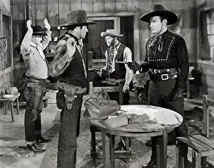 Two Outlaws, Two Cowboys; Held At Gunpoint