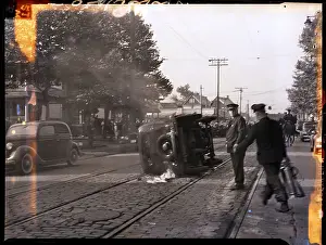 Firefighter Prints: Overturned Car on Fire During Riot in Ohio