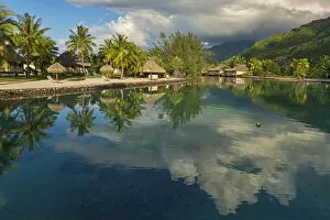 Images Dated 11th March 2013: Overwater bungalows, evening atmosphere, Moorea, French Polynesia