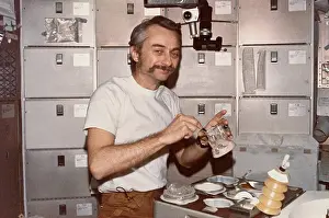 Owen Garriott Mixing His Food
