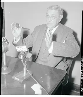 Owen J. Roberts Speaking with Pipe in Hand