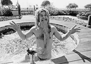Ozzy Osbourne, Former Lead Singer Of Black Sabbath, In His Hot Tub In The garden Of His Luxury Home In Beverly Hills, California.April 1982