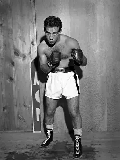 Prints of NEW YORK, NY - CIRCA 1951: Lightweight professional boxer Paddy DeMarco (1928-1997) of the United States poses for a portrait circa 1951 at Stillman's Gym in New York, New York In the Ring: The Art of Boxing: Paddy DeMarco