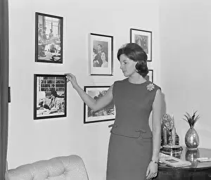 Pamela Turnure Observing Wall Portraits