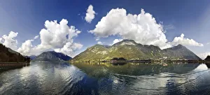 Panorama of Lake Achensee with the Rofan Mountains and bizarre clouds in the sky Panorama of Lake Achensee with the Rofan Mountains and bizarre clouds in the sky