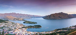 South Island New Zealand Gallery: Panoramic elevated view of Queenstown at dusk, New Zealand