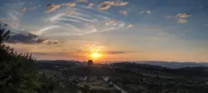 Panor Prints: Panoramic photo of the Voortrekker Monument at sunset with a view of the Magaliesburg Mountains in the Background