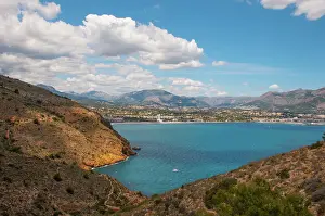 Prints of Panorama taken from El Faro lighthouse looking out onto the bay of Altea with Albir town and Altea town on the coastline, Sierra Helada Natural Park Travel Destination Prints: Panoramic view of Albir and Altea with the turquoise waters of Altea bay