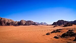 Images Dated 28th January 2016: Panoramic view of Wadi Rum with clear blue sky background and some rock boulders