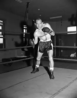 Prints of NEW YORK, NY - OCTOBER 15: Lightweight professional boxer Paolo Rosi (1928-2004) of Italy poses for a portrait on October 15, 1957 at Stillman's Gym in New York, New York In the Ring: The Art of Boxing: Paolo Rosi