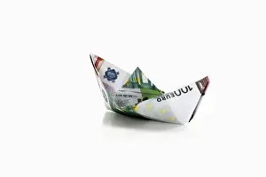 Bank Prints: Paper boat from euro notes