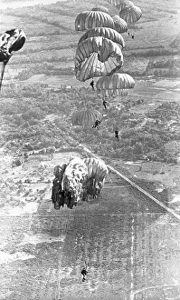 Paratroopers Float Down From Plane