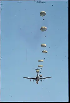 Paratroopers Jumping from Airplane