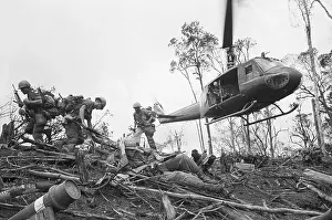 Bell Uh 1 Iroquois Prints: Paratroopers Running Beneath Helicopter