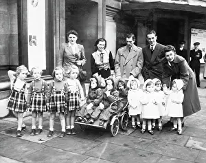 Rare Prints: Parents And Three Sets Of Quadruplets