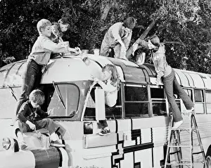 School Bus Prints: Partridge Family Cast Renovating Bus