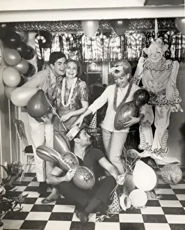 Party in decorated rumpus room