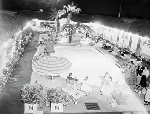 Outdoor Furniture Prints: Party by Swimming Pool at Normandy Village Hotel