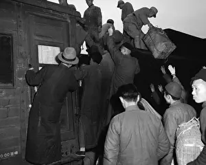 Passengers Climbing on Top of Train