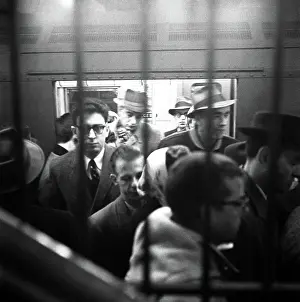 Prints of NEW YORK, NY - JANUARY 1959: Passengers exiting the New York City subway in January 1959 in New York City, New York. (Photo by David Attie/Getty Images) Portraits, Artworks, and Montages from a Visionary Photographer: Passengers Exiting the New York City Subway in the 1950's