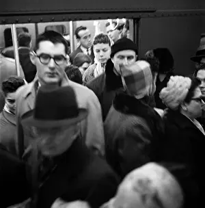 Prints of NEW YORK, NY - JANUARY 1959: Passengers exiting the New York City subway in January 1959 in New York City, New York. (Photo by David Attie/Getty Images) Portraits, Artworks, and Montages from a Visionary Photographer: Passengers Exiting the New York City Subway in the 1950's