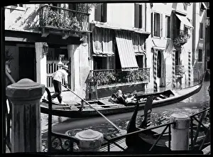 Slow Prints: Passengers Ride In Venetian Gondola