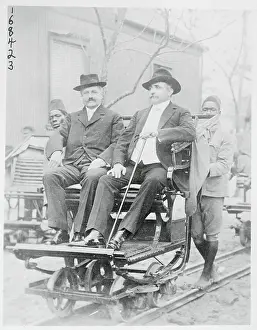 Passengers Sitiing in Handcar