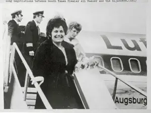 Passengers Walking out of Airplane
