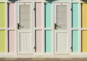Pastel coloured beach cabins, Riccione, Emilia-Romagna region, Italy